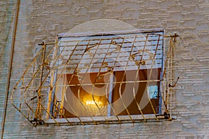 Traditional Menorahs placed for display in the window