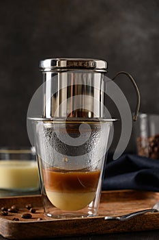 Traditional method of making vietnamese coffee with condensed milk.