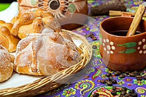 Traditional Mexican bread of the dead pan de muerto with coffe