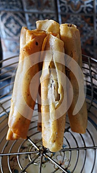 Traditional mexican golden fried tacos