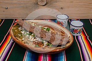 Traditional mexican huarache in clay dish photo