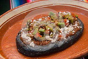 Traditional mexican sope with blue tortilla