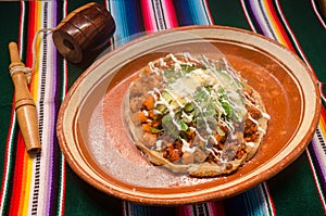 Traditional mexican sope with chorizo