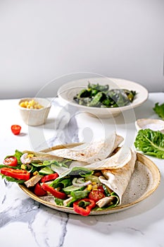 Traditional mexican tortila wrap with pork meat