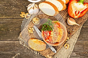 Traditional Middle Eastern dip Muhammara. Roasted red bell pepper with walnuts and spices