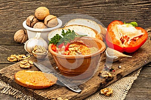 Traditional Middle Eastern dip Muhammara. Roasted red bell pepper with walnuts and spices