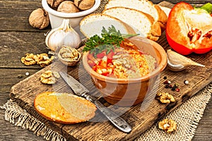 Traditional Middle Eastern dip Muhammara. Roasted red bell pepper with walnuts and spices