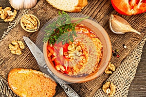 Traditional Middle Eastern dip Muhammara. Roasted red bell pepper with walnuts and spices