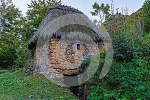 Traditional mill with a broom roof, Teito, in the town of Valle de Lago in the council of Somiedo, in Asturias. photo