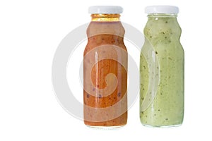 Traditional Mojo verde sauce in bottles. photo