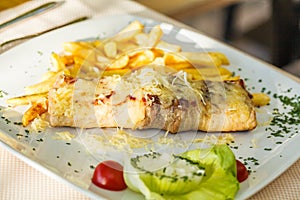 Traditional Montenegrin Meat Negush Steak on white plate in a restaurant
