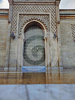 Traditional Moroccan artisanal door with moroccan mosaic tiles and architecture at the Mohammed V mausoleum in Rabat Morocco