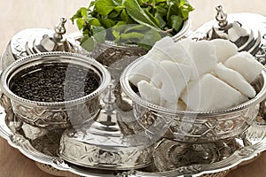 Traditional Moroccan bowls with sugar,mint and tea