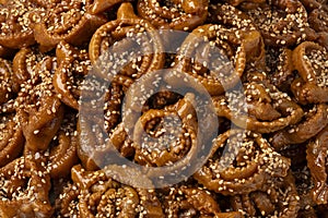 Traditional Moroccan fresh baked chebakia close up for Ramadan full frame as background