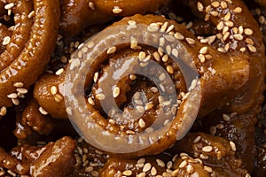 Traditional Moroccan fresh baked chebakia for Ramadan close up full frame