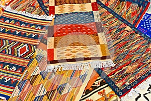 Traditional Moroccan handwoven carpets with oriental patterns background texture