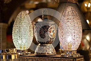 Traditional Moroccan market with souvenirs. Traditional handmade lamps