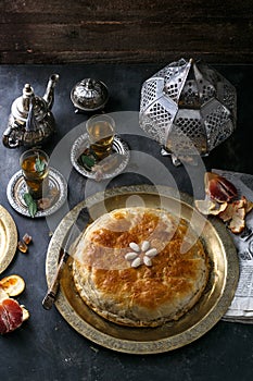 Traditional Moroccan pie pastilla with mint tea