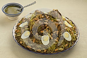 Traditional Moroccan Rfissa dish with eggs and almonds