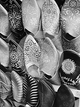 Traditional Moroccan shoes in black and white at Marrakesh, Morocco