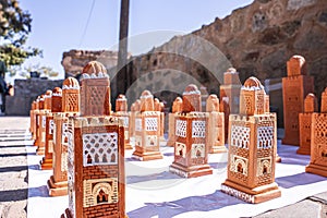 Traditional moroccan souvenirs of handmade religious minaret in Marrakech