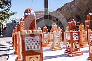 Traditional moroccan souvenirs of handmade religious minaret in Marrakech