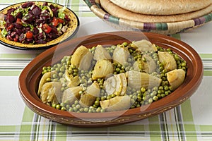 Traditional Moroccan tagine with meat, peas and fennel