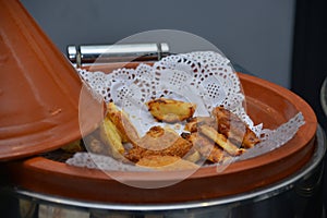 Traditional Moroccan tagine serving .