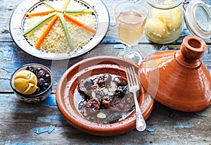 Traditional moroccan tajine of beef and prunes and almonds, close view.