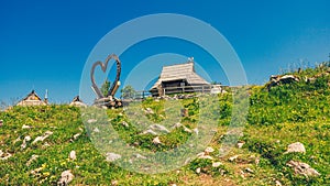 Traditional Mountain Wooden Shepherd Shelters on Big Pasture Plateau or Velika Planina in Slovenia