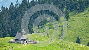 Traditional Mountain Wooden Shepherd Shelters on Big Pasture Plateau or Velika Planina in Slovenia