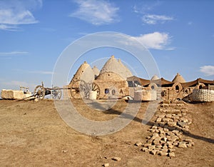 Traditional mudbrick `beehive` house with cone-shaped roofs in Harran, Turkey