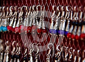 Traditional multicoloured key rings hanging in a shop