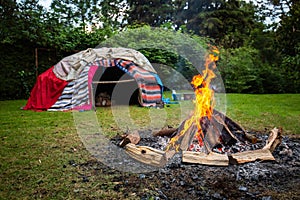 Traditional native sweat lodge with hot stones