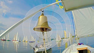 Traditional nautical bell on sailboat, yachting, sailing, symbol