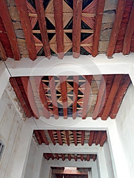 Traditional nceiling ceilinged  with palm tree trunks and  branches of Nerium oleander trees in Figuig  in Morocco