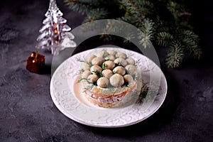 Traditional New Year`s Russian salad `Mushroom Glade` from boiled potatoes, carrots, eggs, smoked meat, soft cheese and marinated