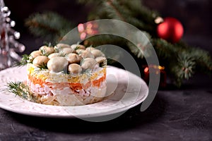 Traditional New Year`s Russian salad `Mushroom Glade` from boiled potatoes, carrots, eggs, smoked meat, soft cheese and marinated