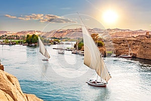 Traditional Nile sailboats near the banks of Aswan, Egypt