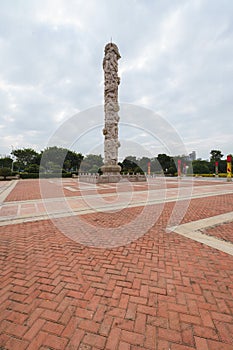 Traditional Nine Dragon Pillar Stone Sculptures at the Gate of Fujian-Taiwan Kinship Museum