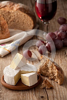 Traditional Normandy Camembert cheese with bread photo