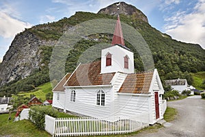 Traditional norwegian white wooden church. Undredal. Travel Norw