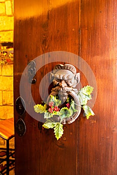 Traditional old antient Maltese door knob with Christmas decoration in Mdina city on Malta