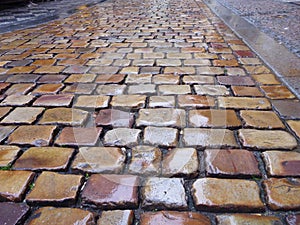 Traditional old cobbles in the rain