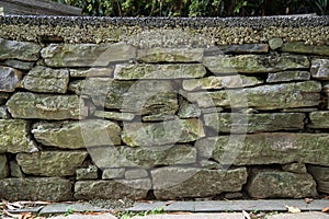 Traditional old dry stone wall background