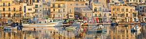 Traditional old fishing village Marsaskala at sunrise in Malta