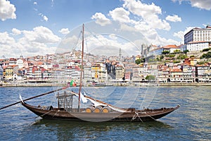 Traditional old portuguese wooden boats called barcos rabelos, used in the past to transport the famous port wine - Oporto - photo