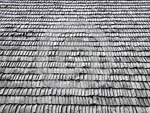 Traditional old roof made of natural wood tiles