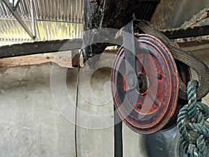 Traditional old rusty Water Well Pulley.