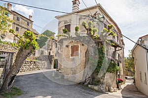 Traditional old stone house in Stanjel city in Slovenia photo